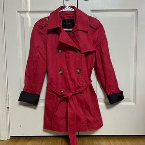 Size small, red, mid-length trench coat with brown lining.